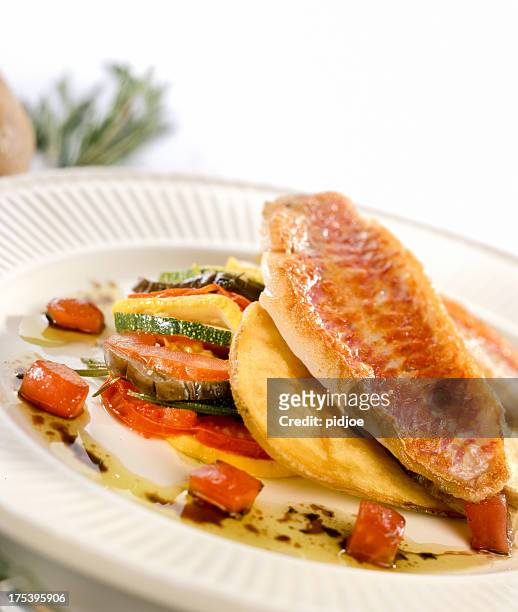 gourmet dish of roasted red mullet - mullet fish stock pictures, royalty-free photos & images