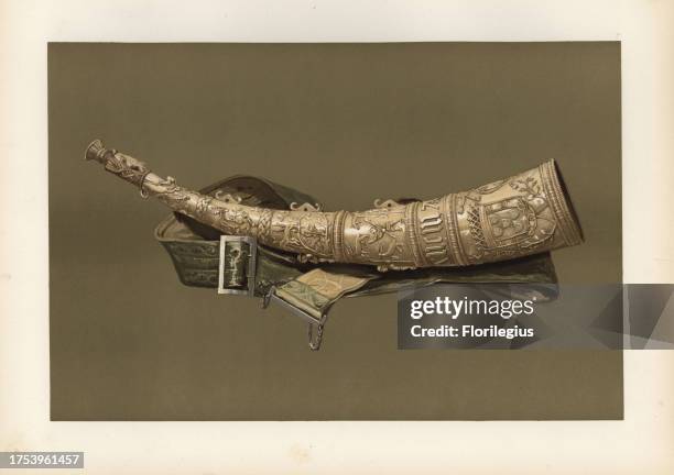 Oliphant or ivory hunting horn carved with the arms and badges of Ferdinand and Isabella of Portugal from the early 16th century. Chromolithograph...