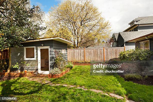 cute little garden shed in back yard - shed stock pictures, royalty-free photos & images