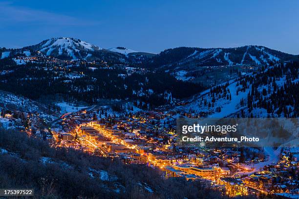 dusk view of park city glowing - utah stock pictures, royalty-free photos & images