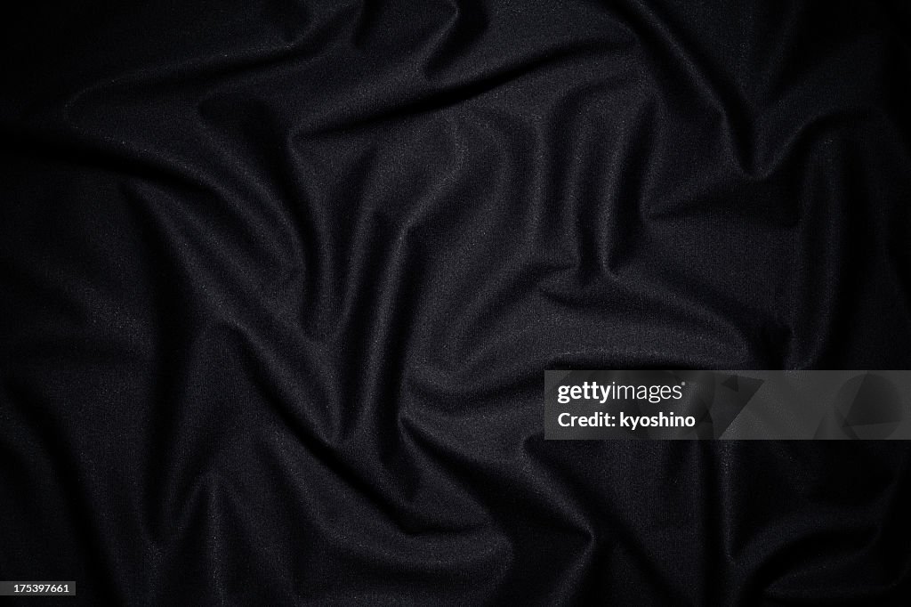 Dark fabric texture background with wave pattern