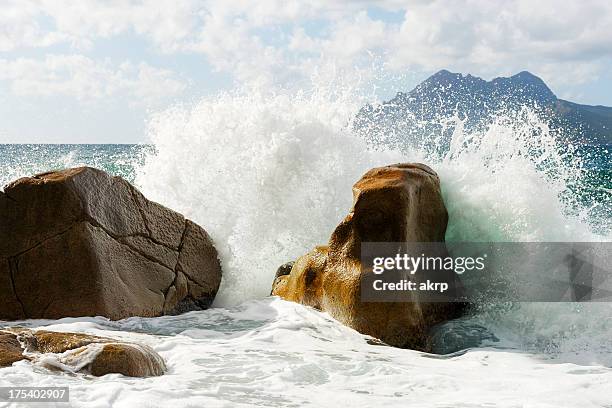 wave splash - waves crashing on rocks stock pictures, royalty-free photos & images