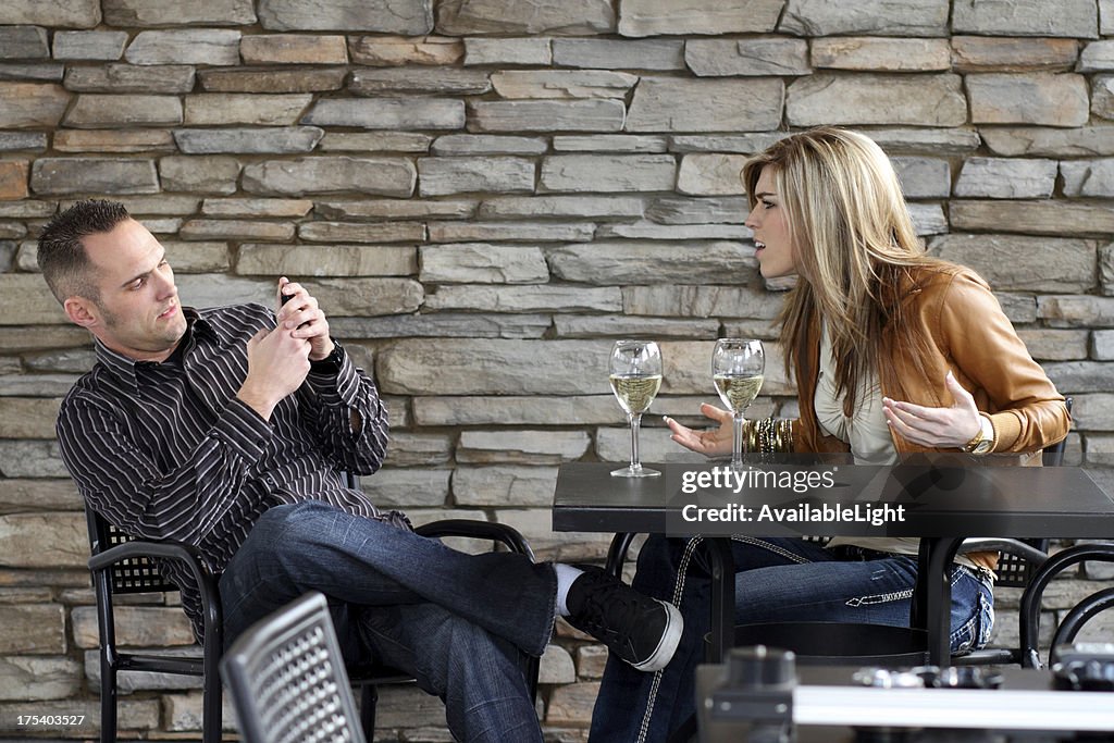Couple on Date Guy Texting