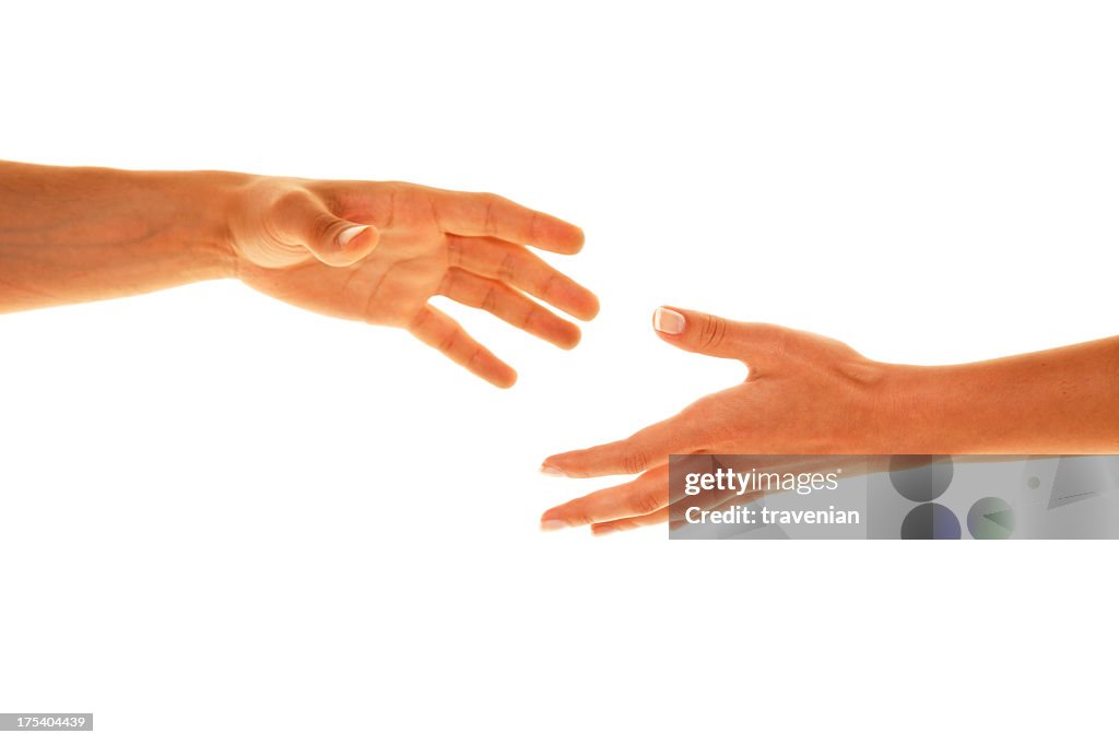Two white people reaching their hands out to each other