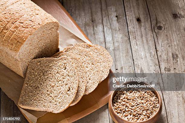 whole wheat bread - whole wheat stock pictures, royalty-free photos & images