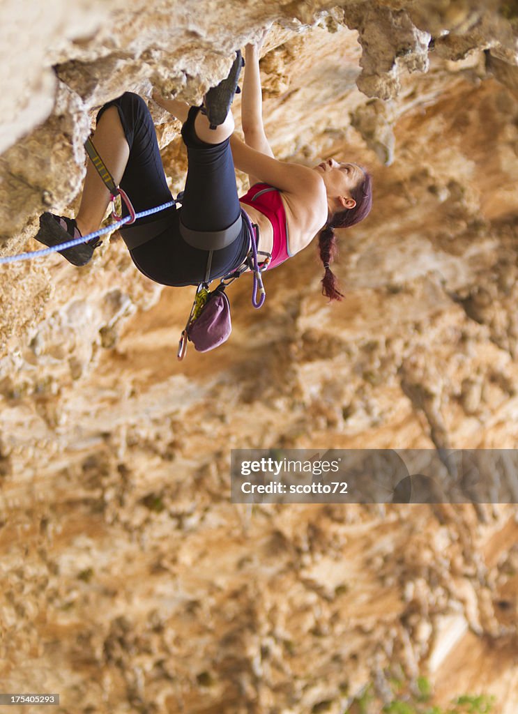 Woman rockclimbing