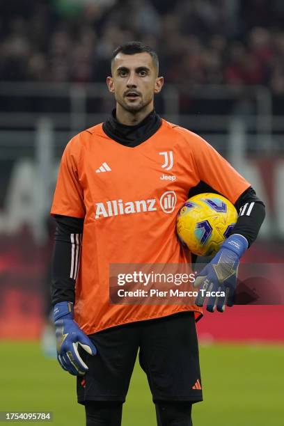 Goalkeeper of Juventus Mattia Perin in action during warm up prior the Serie A TIM match between AC Milan and Juventus at Stadio Giuseppe Meazza on...