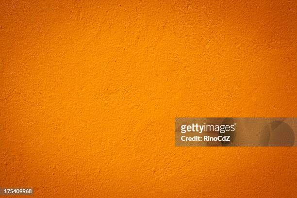textura de parede de laranja - parede - fotografias e filmes do acervo