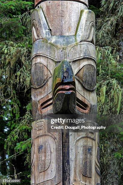 detail of sitka totem pole - haida totem stock pictures, royalty-free photos & images