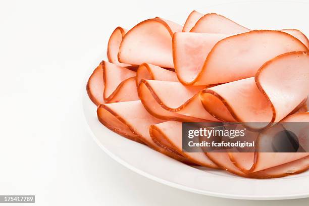 smoked ham slices on a plate - delicatessen stock pictures, royalty-free photos & images