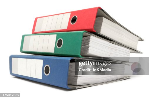 Stack of Three Colored Ring Binders Stack of Three Colored Ring Binders