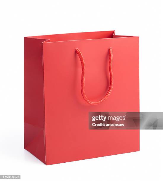 red shopping bag - shopping bags stockfoto's en -beelden