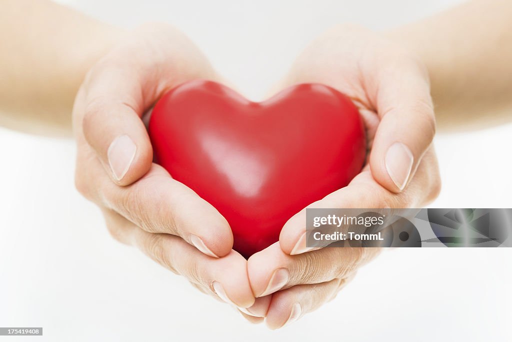 Hands Presenting Heart