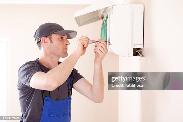 air conditioner - air conditioner installation stock pictures, royalty-free photos & images