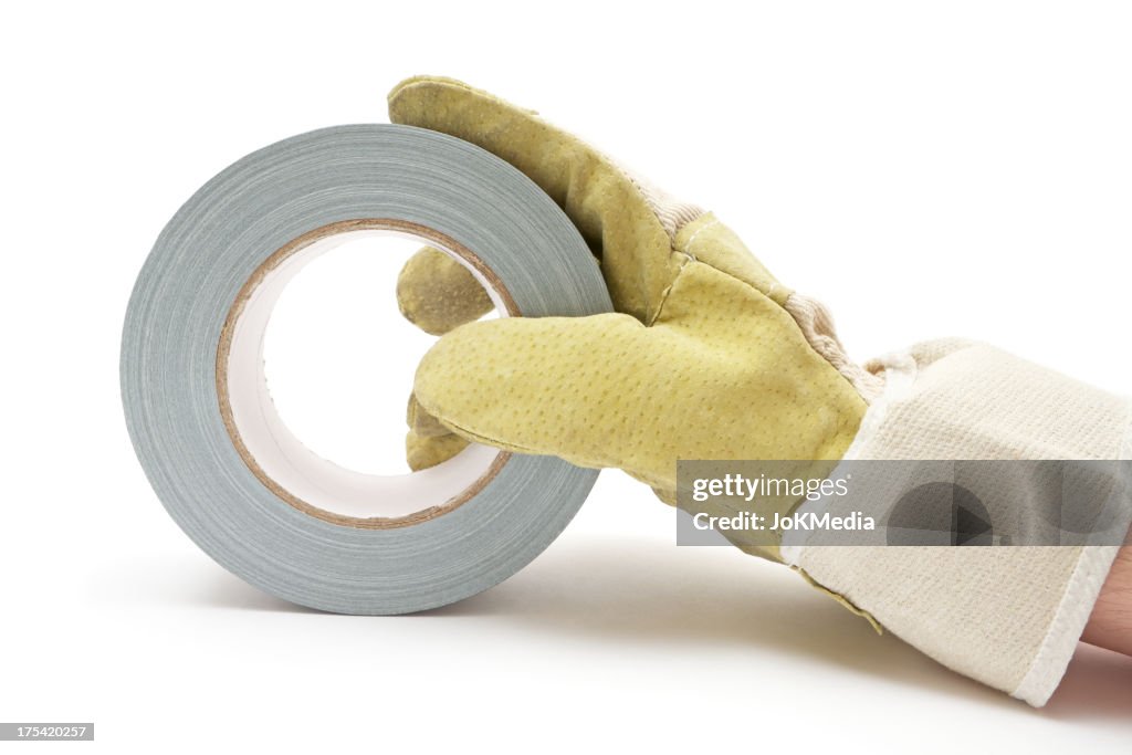 Holding a Roll of Gray Duct Tape