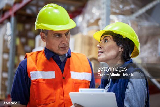 Packer Working 71 Packer Manufacturing Company Stock Photos, High-Res Pictures, and ...