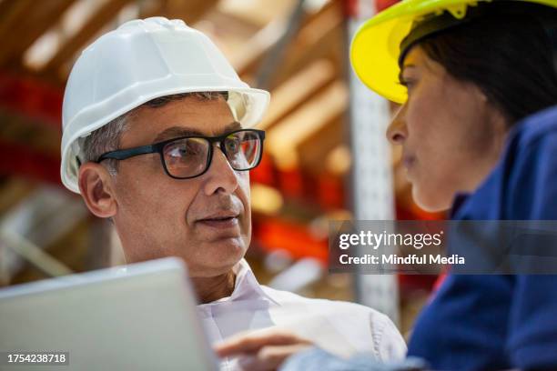 Packer Working 71 Packer Manufacturing Company Stock Photos, High-Res Pictures, and ...