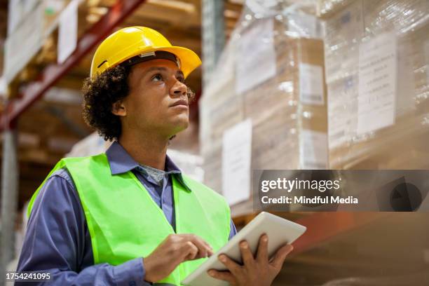 Packer Working 71 Packer Manufacturing Company Stock Photos, High-Res Pictures, and ...