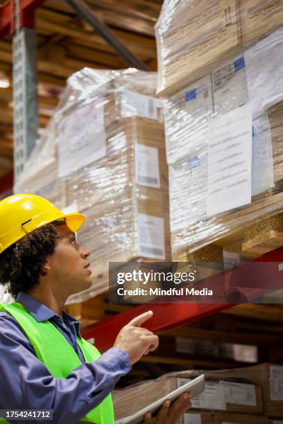 Packer Working 71 Packer Manufacturing Company Stock Photos, High-Res Pictures, and ...