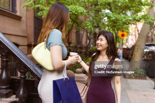 asian girlfriends, walking streets of west village - west front stock pictures, royalty-free photos & images