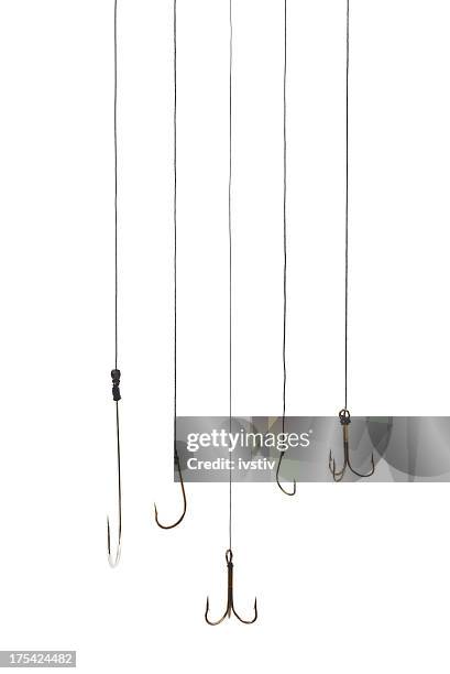 fishing hooks - vishaak visgerei stockfoto's en -beelden