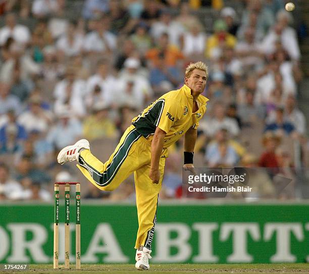 Shane Warne of Australia bowls during the second match in the VB series One Day International finals between Australia and England held at the...