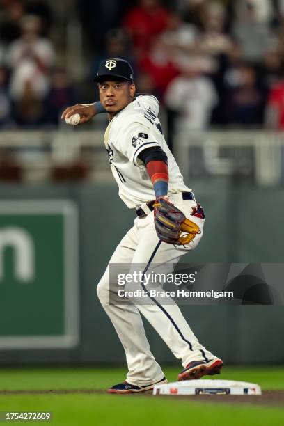 Jorge Polanco of the Minnesota Twins throws during game four of the Division Series against the Houston Astros on October 11, 2023 at Target Field in...