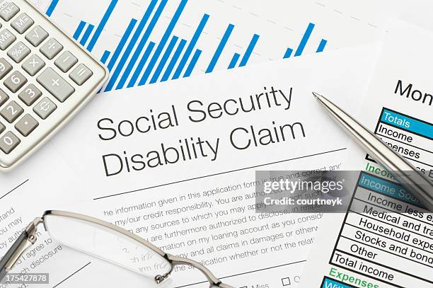 social security disability claim form - social security application stock pictures, royalty-free photos & images