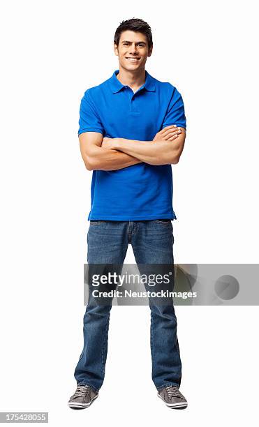 hombre joven de pie con los brazos cruzados aislado - blue shirt fotografías e imágenes de stock