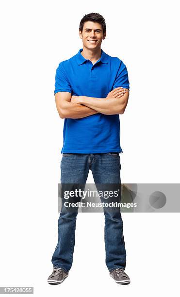 young man standing with arms crossed - isolated - tshirt jeans stockfoto's en -beelden