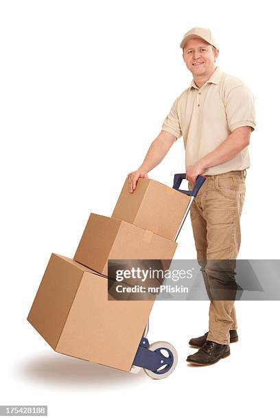 delivery person with trolley and boxes - delivery person on white stock pictures, royalty-free photos & images