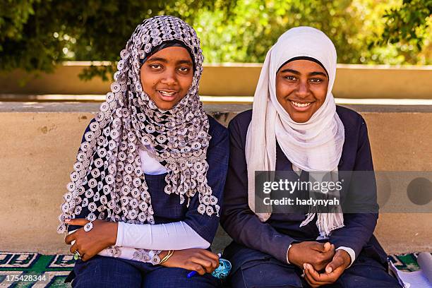two muslim female students in southern egypt - north african culture stock pictures, royalty-free photos & images