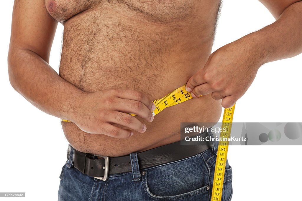 Overweight African American Man Measuring Waist