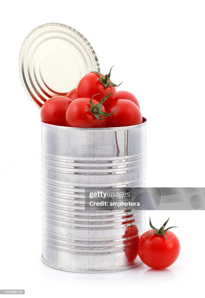Open can with fresh tomatoes inside