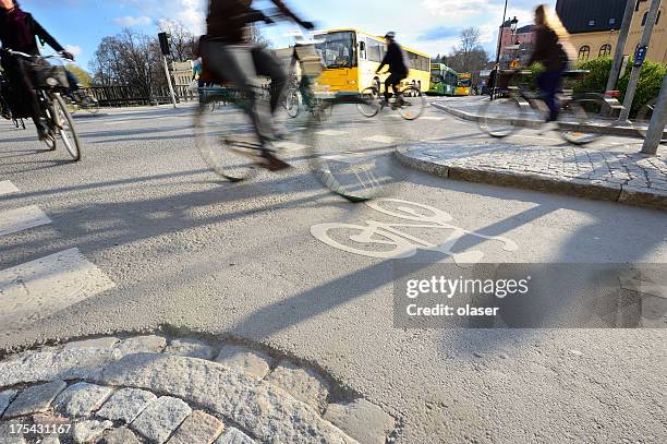 motion blurred bikes - uppsala stock pictures, royalty-free photos & images