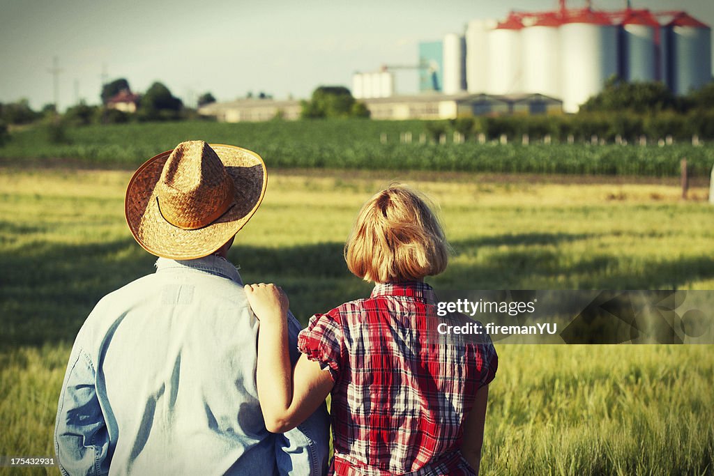 Couple looking at farm