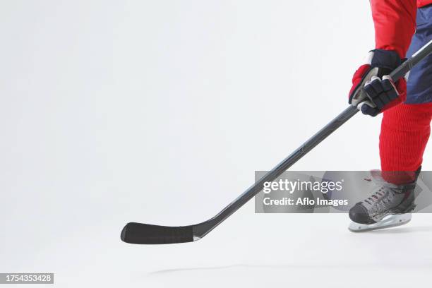 male hockey player - ice hockey stick stock pictures, royalty-free photos & images
