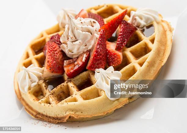 belgian waffle with strawberries - belgium waffles stock pictures, royalty-free photos & images