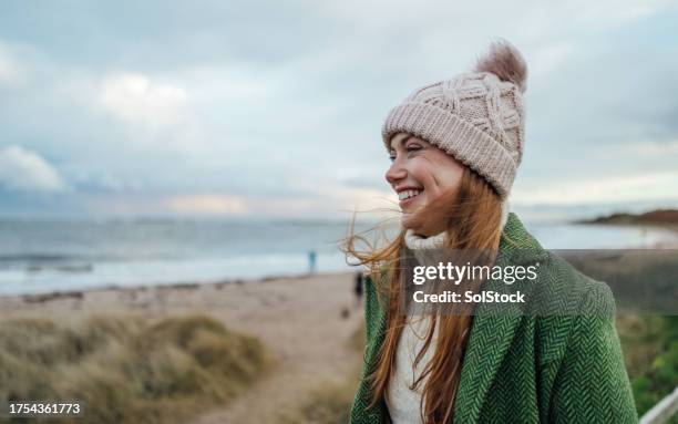 feeling happy at the beach - female water polo stock pictures, royalty-free photos & images