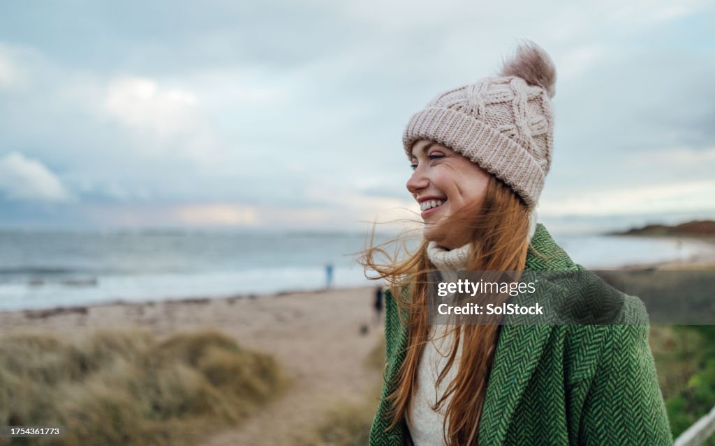 Sentindo-se feliz na praia
