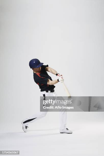 baseball batter against white background - batting isolated stock pictures, royalty-free photos & images