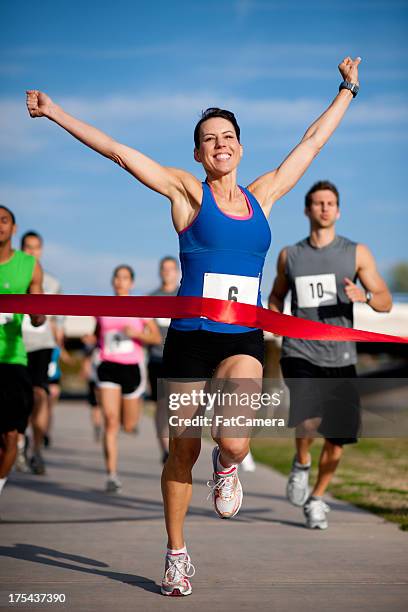 runners - direct klaar camera stockfoto's en -beelden
