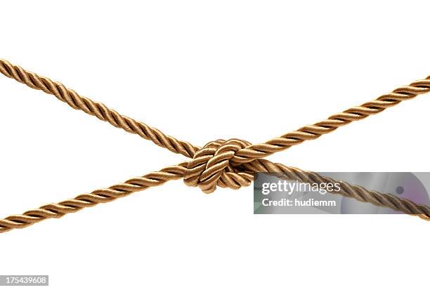 gold knot (clipping path!) isolated on white background - touw stockfoto's en -beelden