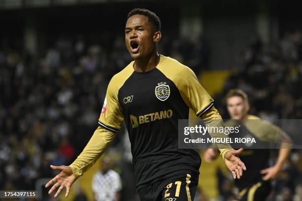 Sporting Lisbon's Mozambican forward Geny Catamo celebrates after scoring his team's first goal during the Portuguese league football match between...