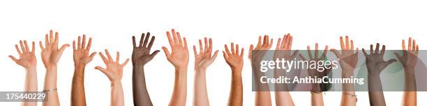 different natioanlity hands waving toward camera - waving stock pictures, royalty-free photos & images