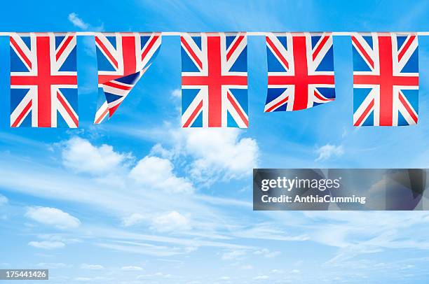 red, white and blue union jack bunting with copy space - uk flag stock pictures, royalty-free photos & images