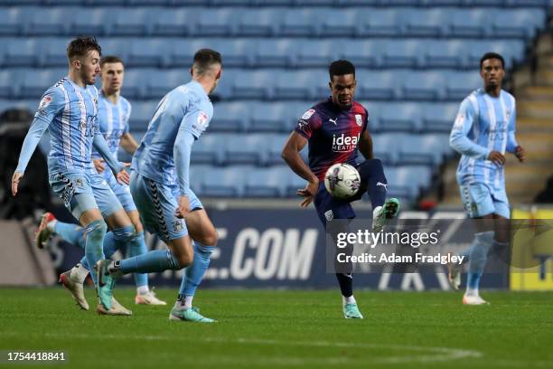 Grady Diangana of West Bromwich Albion is surrounded during the Sky Bet Championship match between Coventry City and West Bromwich Albion at The...