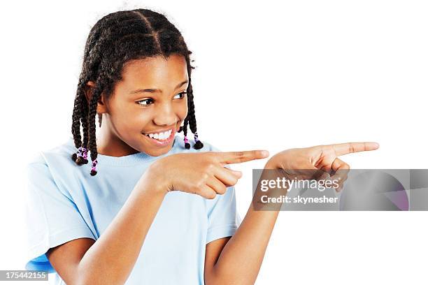 african american girl pointing aside. - girl pointing bildbanksfoton och bilder