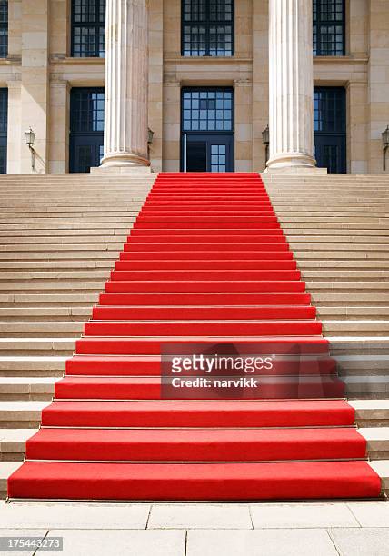 red carpet on the staircase - red carpet entrance stock pictures, royalty-free photos & images