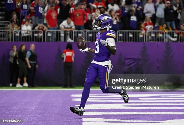 Jordan Addison of the Minnesota Vikings celebrates his first half touchdown against the San Francisco 49ers at U.S. Bank Stadium on October 23, 2023...